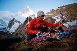 David Lama preparing his equipment to climb the Masherbrum in Pakistan.